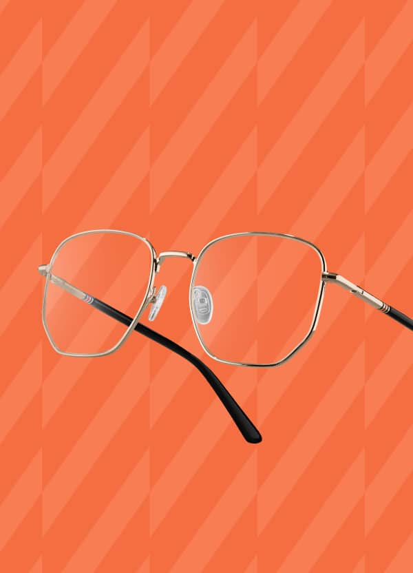 Zenni “Hendrix” optical glasses from Jrue Holiday’s collection float against an orange patterned background.