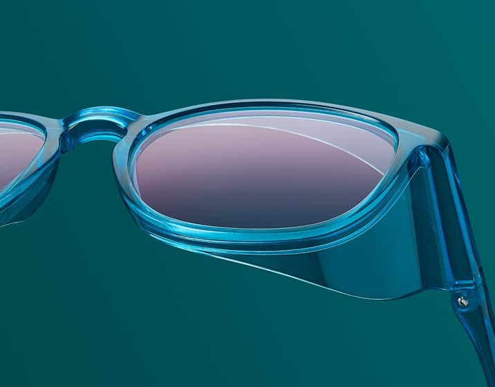 Trivex impact-resistant clear lenses in blue square Zenni safety frames with side shields.