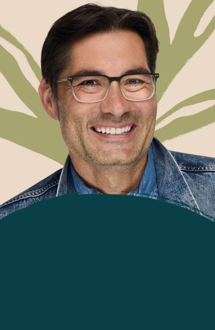 Smiling man wearing gradient rectangular eyeglasses featured on a light beige background with green leaf artwork.