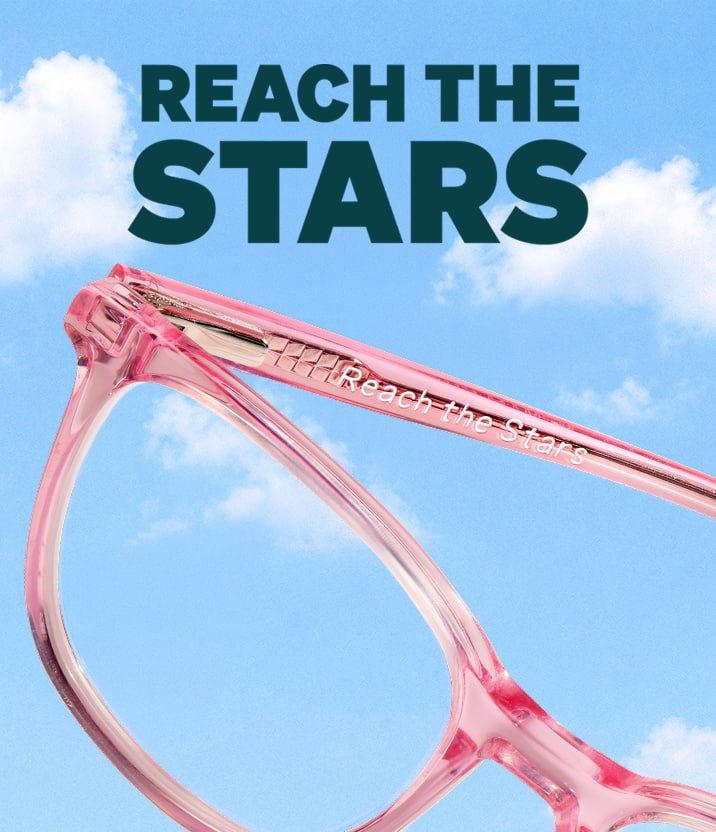 Pink rectangle Zenni glasses engraved with "Reach the Stars," against a cloudy sky background.