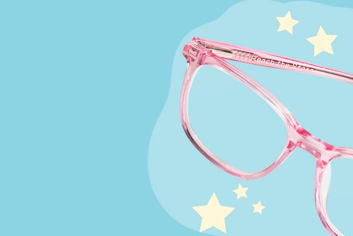 Pink rectangle Zenni glasses with an engraved temple, on a light teal background with stars.