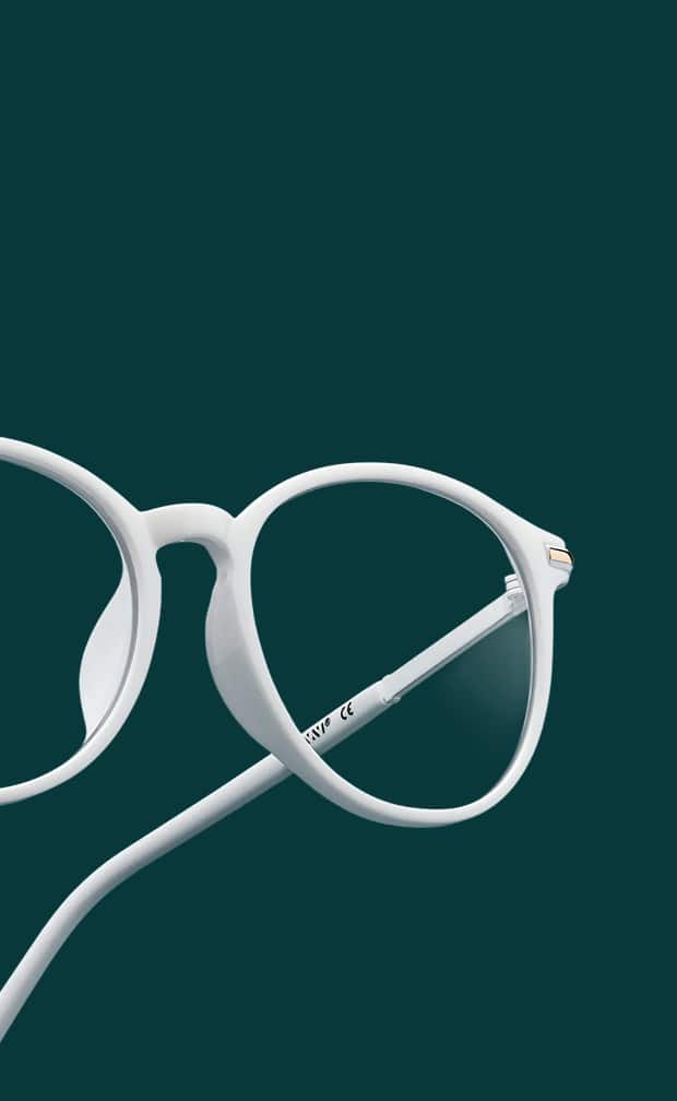 Zenni white eyeglasses with blue-light-filtering lenses on a dark teal background.
