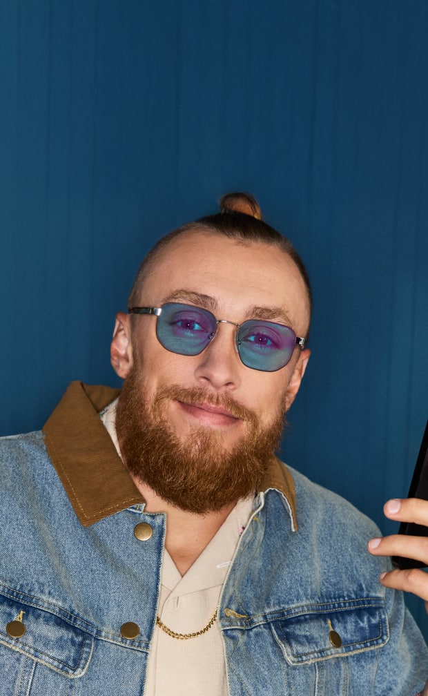George Kittle wearing Zenni ID Guard glasses.