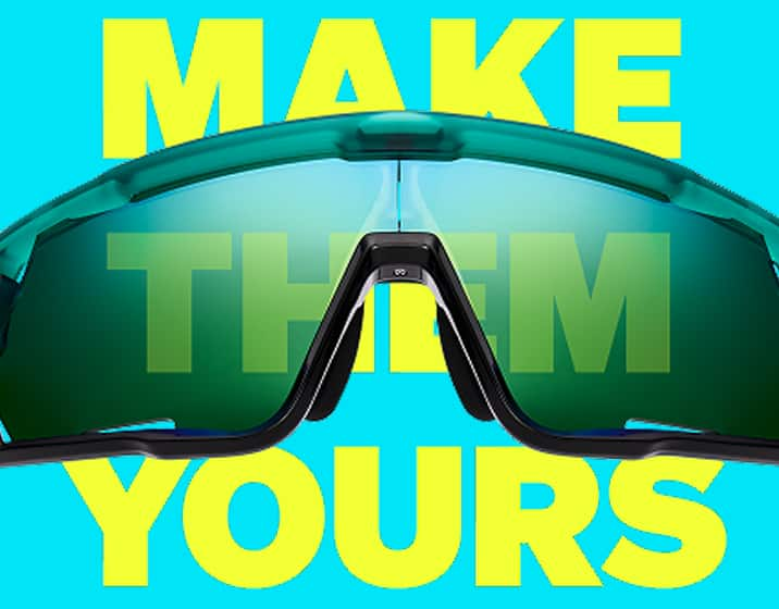 Close-up of Zunnies Sports Sunglasses with tinted lenses against a blue background with yellow text “Make Them Yours.”