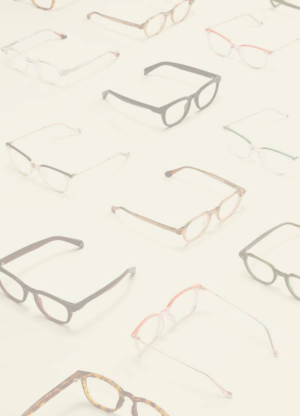 Various Zenni eyeglass frames arranged on a light background