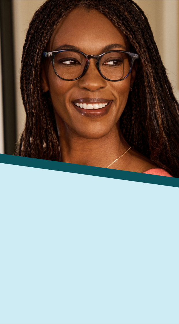 A woman with long brown and black braids wearing Zenni round tortoiseshell glasses. Background is a well-lit kitchen overlaid with a pale blue and teal pinwheel graphic.