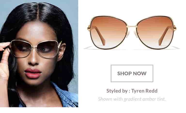 Model styled by Tyren Redd wearing premium cat-eye sunglasses #1135415 in gold metal with gradient amber tint.