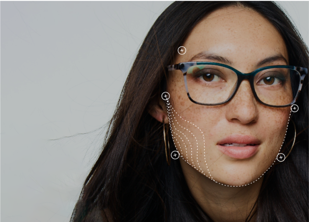 A woman wearing glasses with digital points that follow her face shape.