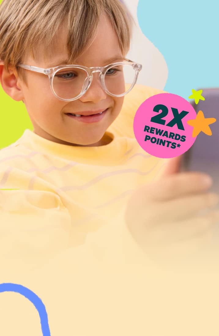 Child wearing clear Zenni glasses while using a tablet on a playful graphic background.