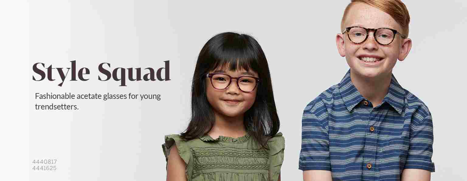 Young girl with dark brown hair and bangs wears tortoiseshell Spark cat-eye glasses #4440817 and a green ruffle top; boy with red hair and freckles wearing tortoiseshell Dream round glasses #4441625 and blue-striped polo shirt.