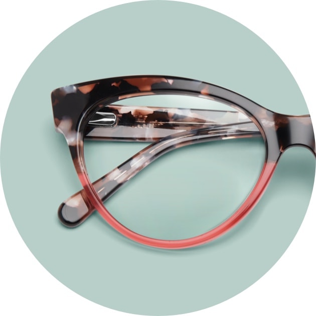 Cat-eye glasses #4434139 with two-tone pattern of tortoiseshell top rim and pink bottom rim with mint green background.