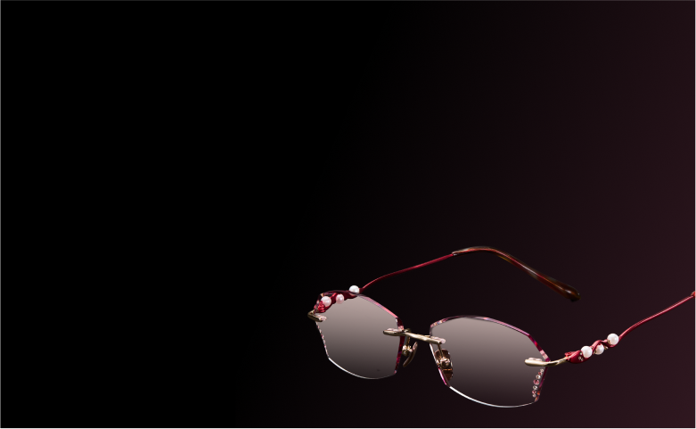 Zenni jeweled rimless glasses with radiant gem details on handcrafted red frames against a black background.