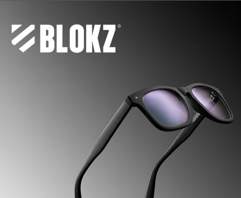 The image features the Blokz® logo and a sleek pair of black glasses, set against a dark gradient background.