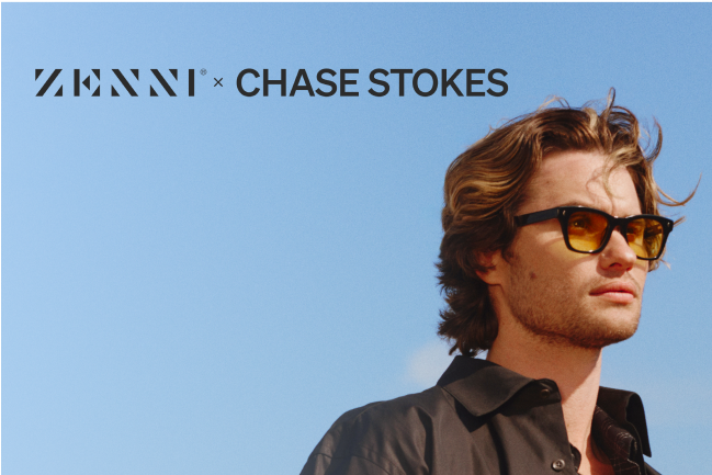 Chase Stokes wearing sunglasses from the Zenni x Chase Stokes collection, styled with a sharp, outdoor look against a clear blue sky.