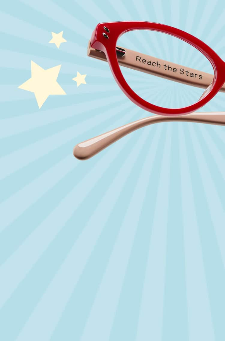 Red Zenni glasses engraved with 'Reach the Stars' from Zenni's Vision of Wellness collection supporting kid’s mental health.