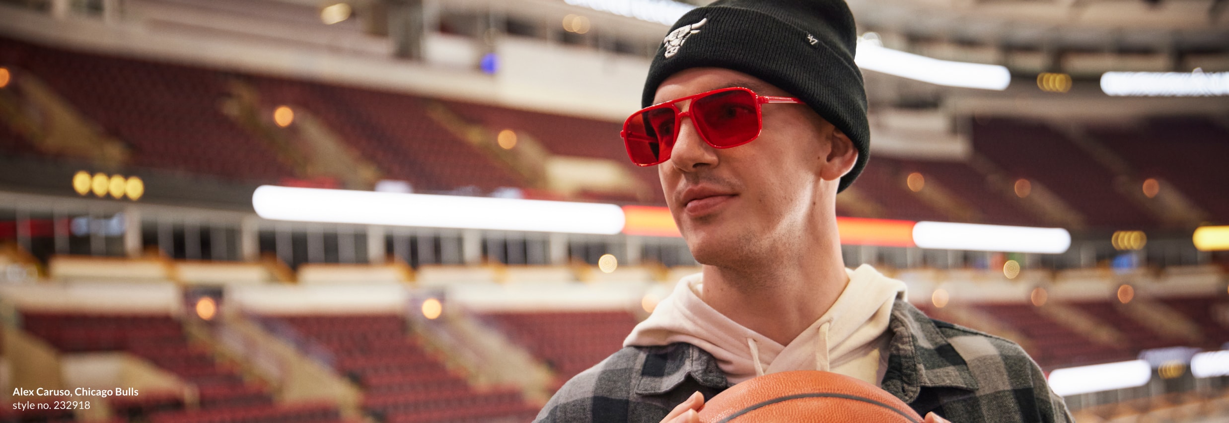 Image of Ryan Arcidiacano wearing Zenni red aviator glasses #232918 inside a basketball arena.