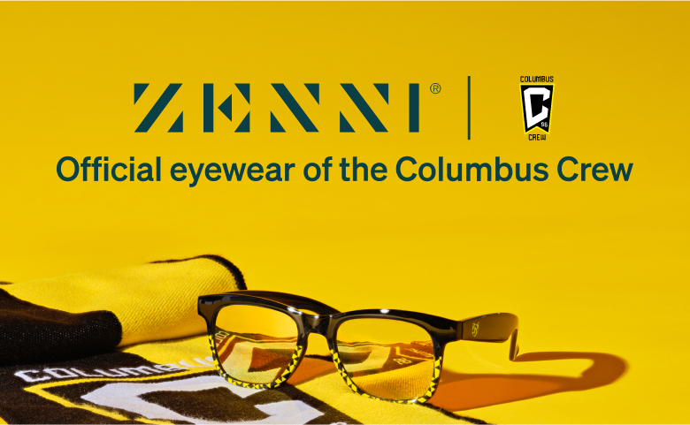 A pair of Zenni Columbus Crew Square Glasses 2043621 rest on a yellow Columbus Crew scarf with a yellow background.