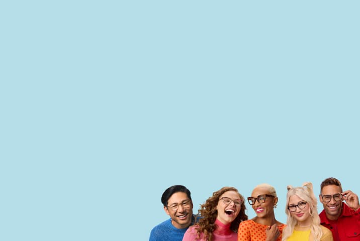 Five diverse people in colorful clothing smile and laugh while showcasing a variety of eyewear including gold aviators, rose gold cat-eye frames, and polka-dot glasses against a light blue background.