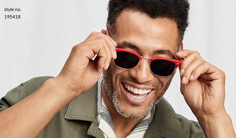 Image of a man wearing Zenni browline sunglasses #195418 against a light gray background.