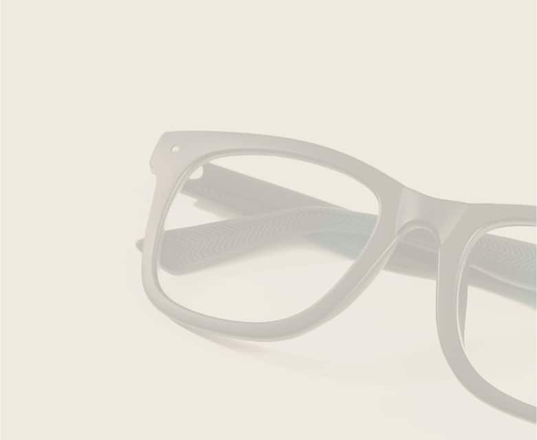 A faded image of a pair of square Zenni glasses in the background.