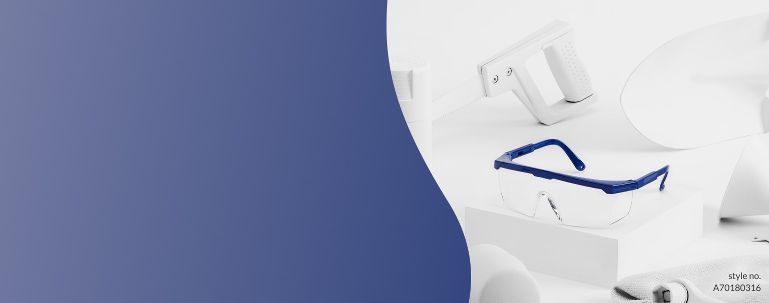 Image of Zenni protective goggles #A70180316 on a white platform, surrounded by tools that are painted white.