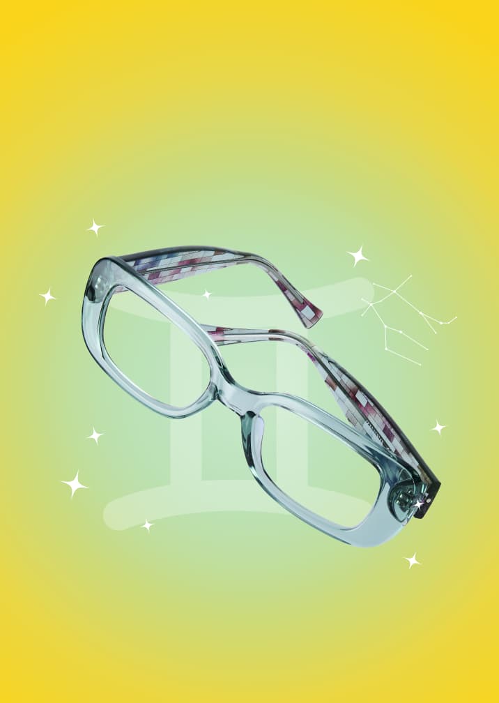 Translucent geometric glasses with checkered arms on a yellow zodiac background with the Gemini symbol and constellation.