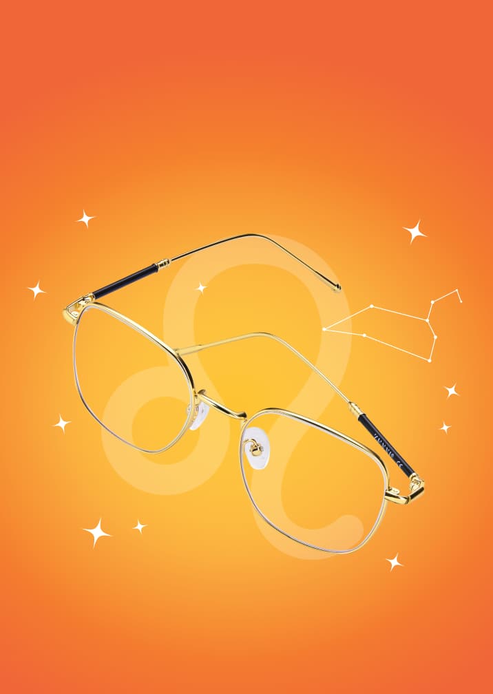 Metal glasses on a vibrant orange background with the Leo symbol and constellation.
