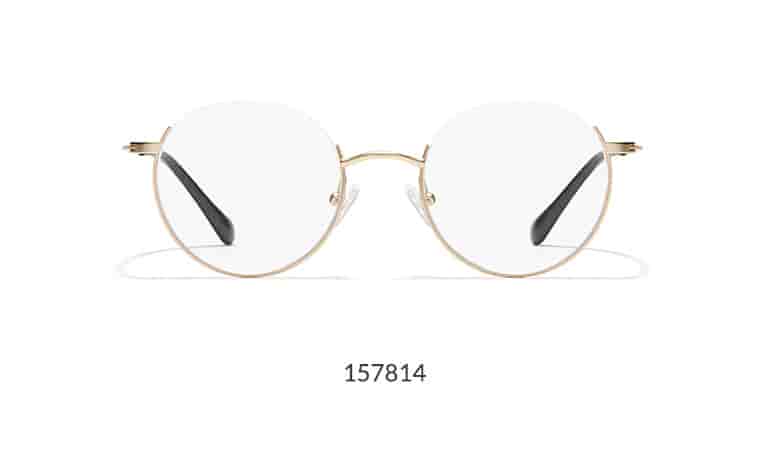 These round gold metal glasses feature a striking “reverse half-rim” design.