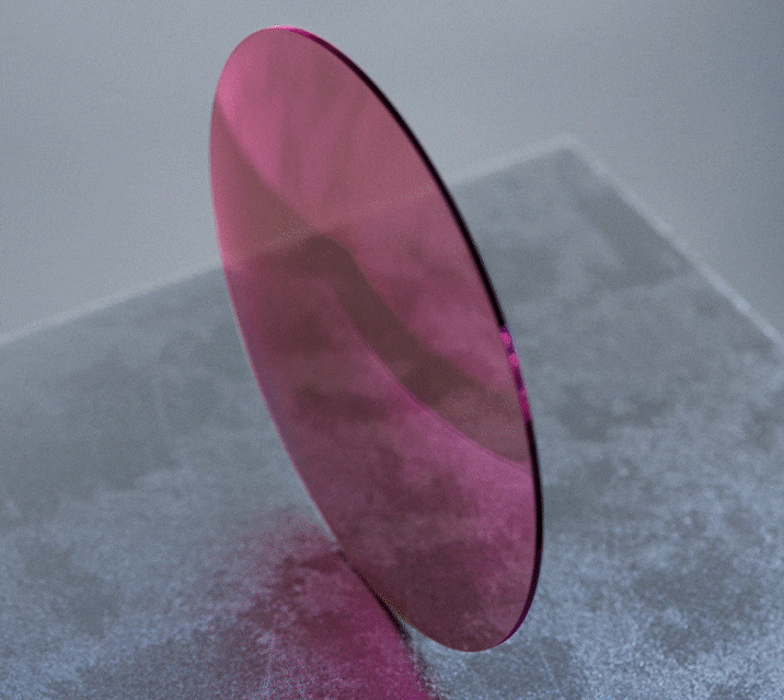 A 3D rendering showing a ray of blue light being stopped by a rose-tinted Blokz blue light filtering lens, on a gray industrial-looking background.