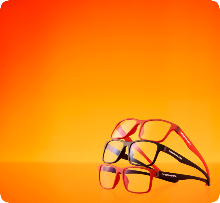 Three pairs of Dreamhack X Zenni glasses in dark orange and black frames, stacked on top of each other on orange background.