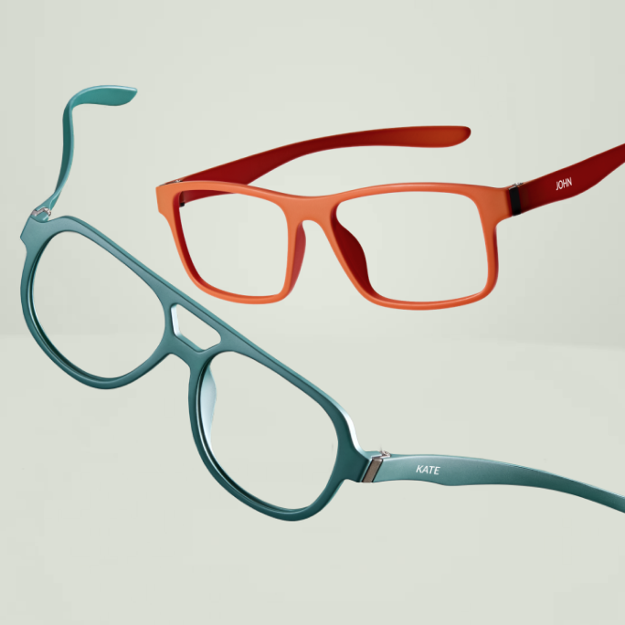 Close-up of two Zenni OptiFlex frames in teal and orange, showing personalization with the names Kate and John on the temples.