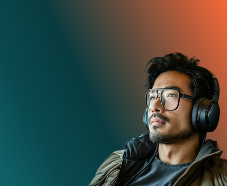 Man wearing brown jacket and black headphone, with Zenni black aviator glasses.