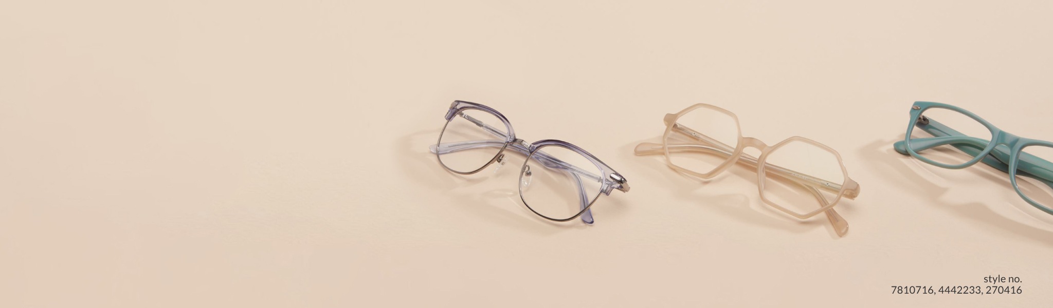Image of three pairs of Zenni glasses against a beige-colored background.