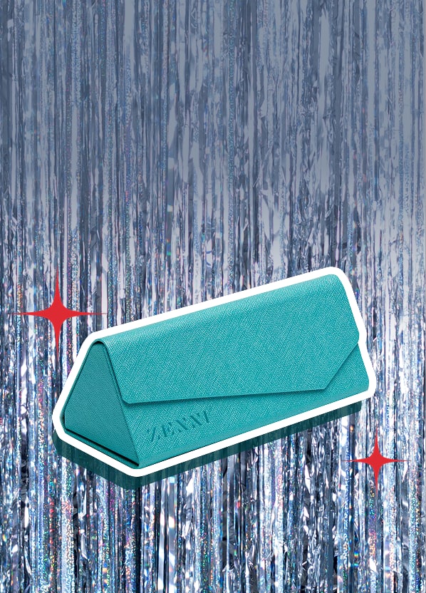 Teal folding eyeglass case on silver tinsel background with illustrated red star accents
