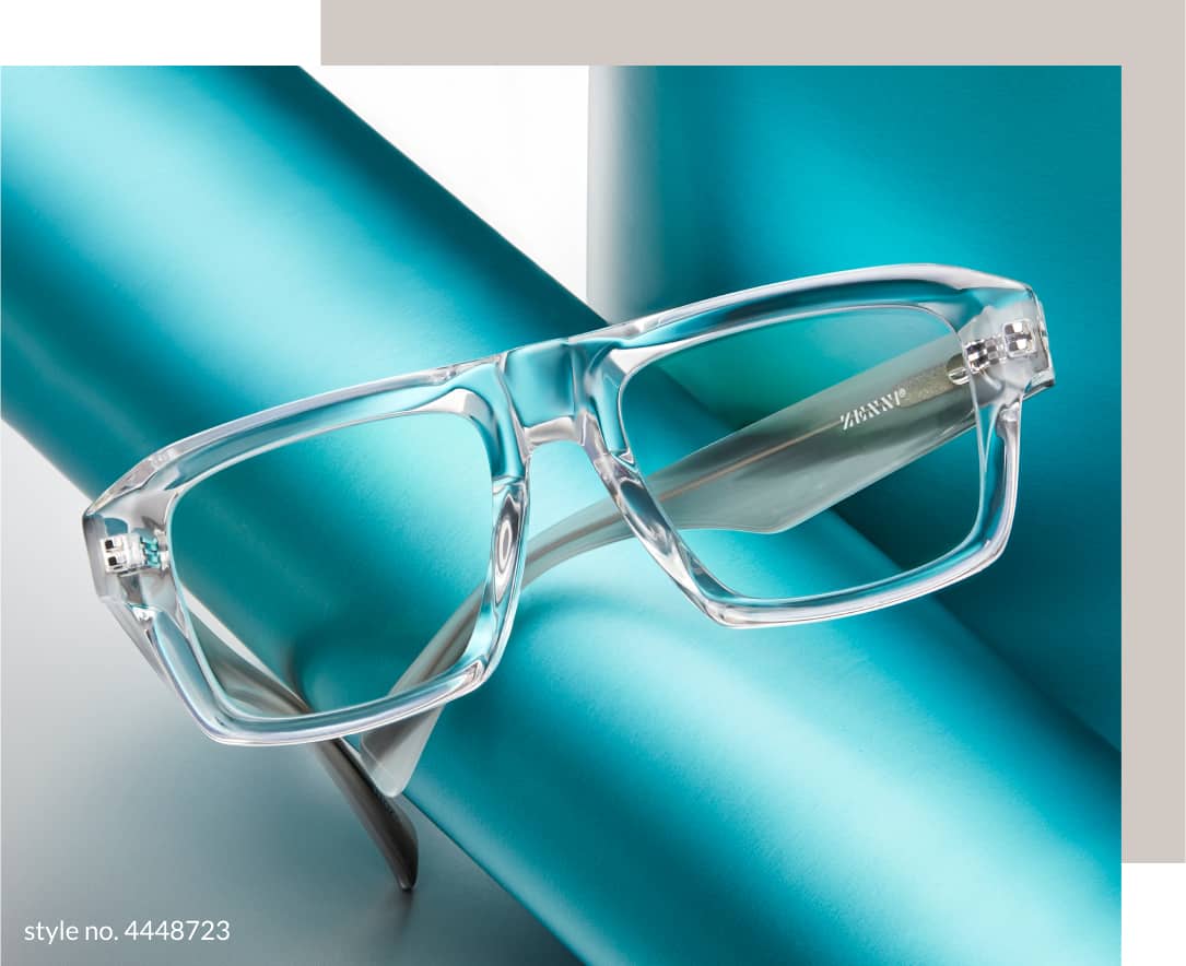 Image of Zenni rectangle glasses #4448723, resting atop a roll of teal wrapping paper, against a teal and white background.