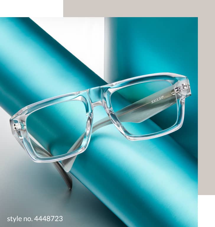 Image of Zenni rectangle glasses #4448723, resting atop a roll of teal wrapping paper, against a teal and white background.