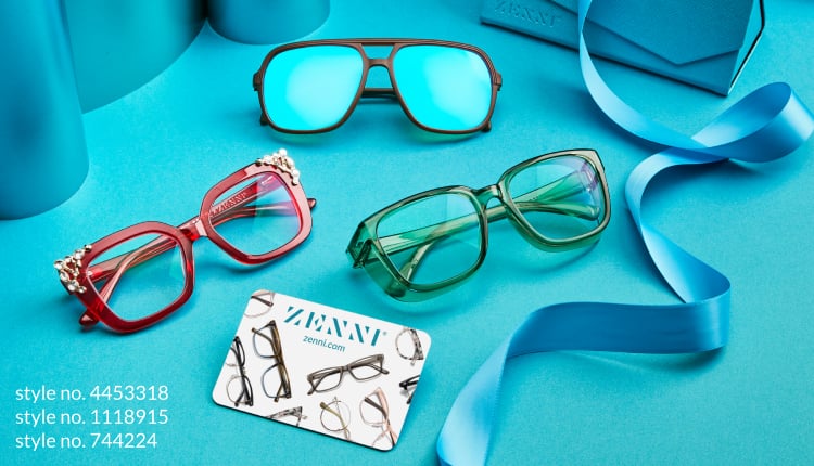 Image of three pairs of Zenni glasses and a gift card, against a teal background surrounded by blue ribbon.