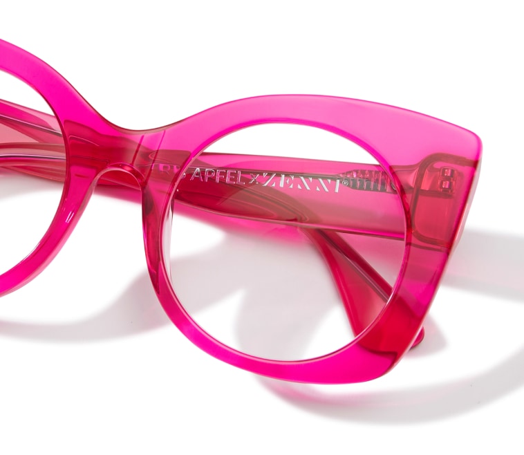 Neon pink transparent cat-eye glasses.