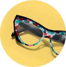 Image of Zenni cat-eye glasses #4449139 against a yellow background.