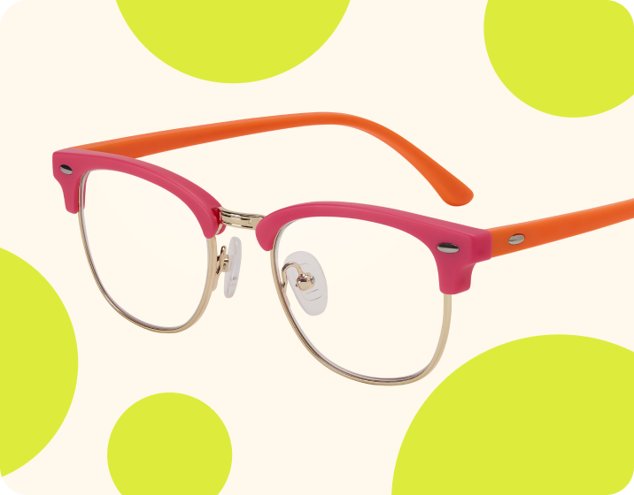 Red browline kids’ glasses on a beige background with green circles.
