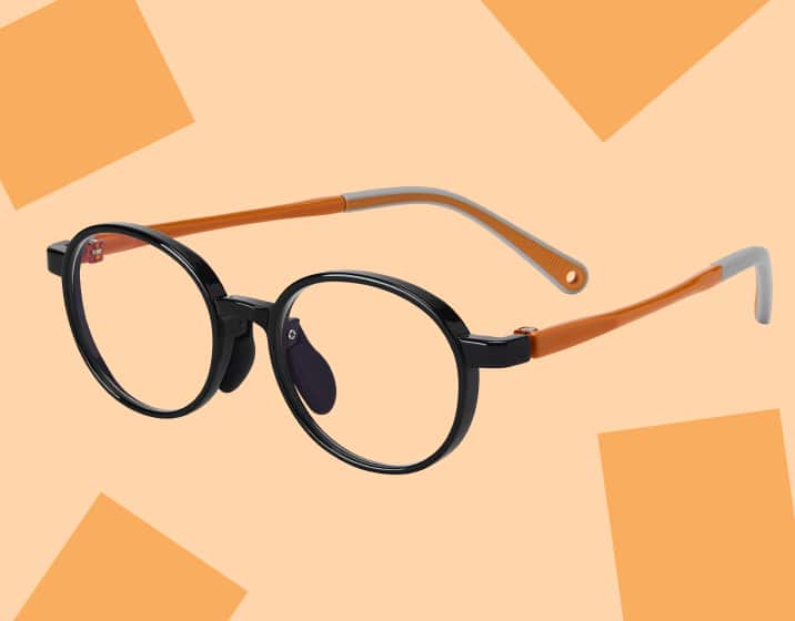 Round black and orange kids’ glasses on a beige background with orange squares.