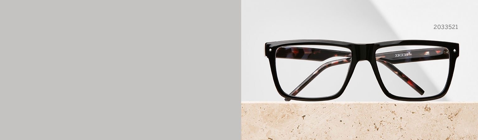 Flat top. Image of Zenni flat top glasses #2033521 on a beige marble countertop. 