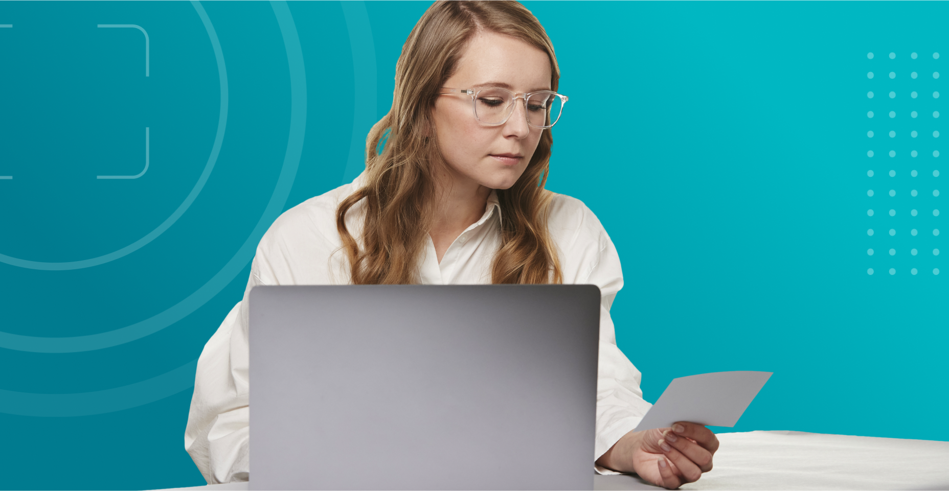 Woman checking her prescription to make sure the information matches.