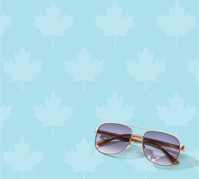 Gold aviator with gradient tints on a light blue background with white leaves pattern.