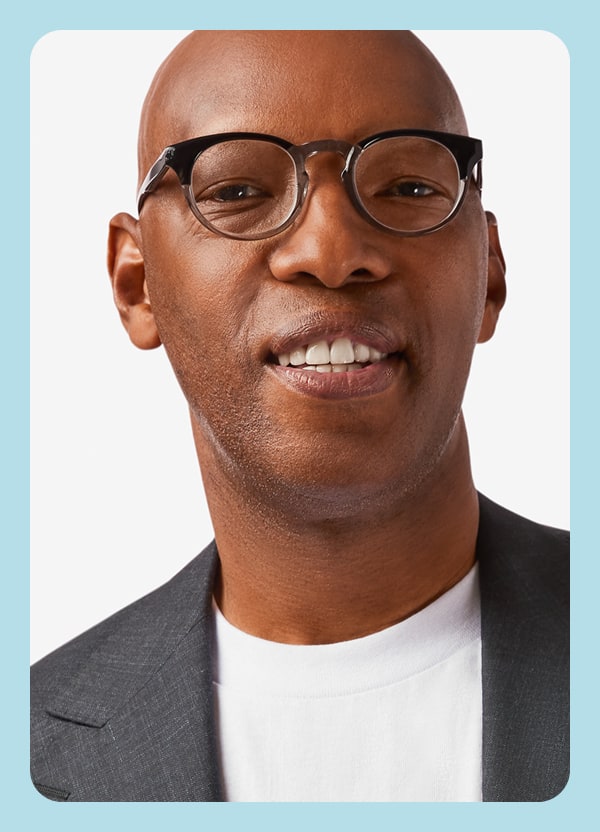 A close-up of Sam Cassell in stylish Zenni frames from his Coach’s Collection.