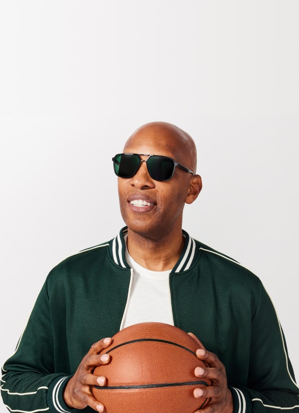 Sam Cassell in Zenni sunglasses, 'Victory in Every View' overlay. ‘View product’ prompt.