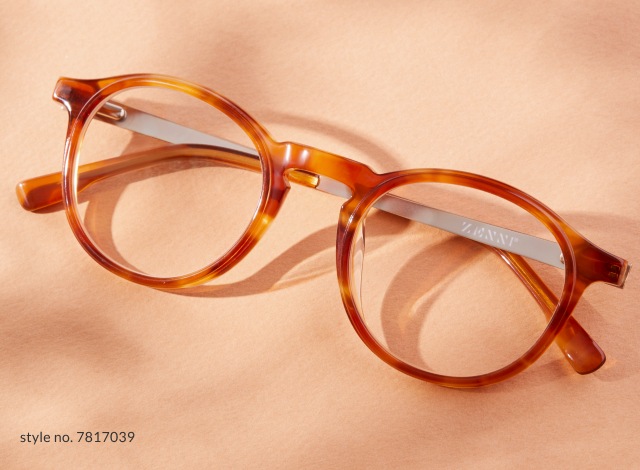 Two images: one of a man wearing Zenni round glasses #7827915, and Image of Zenni round glasses #7817039, with the sun shining on them, against a peach-colored background.