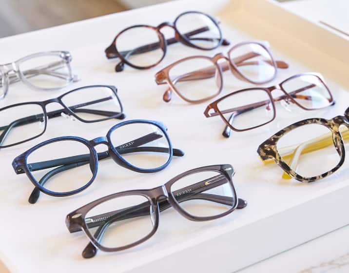 Image of 8 Zenni frames in different colors and shapes.