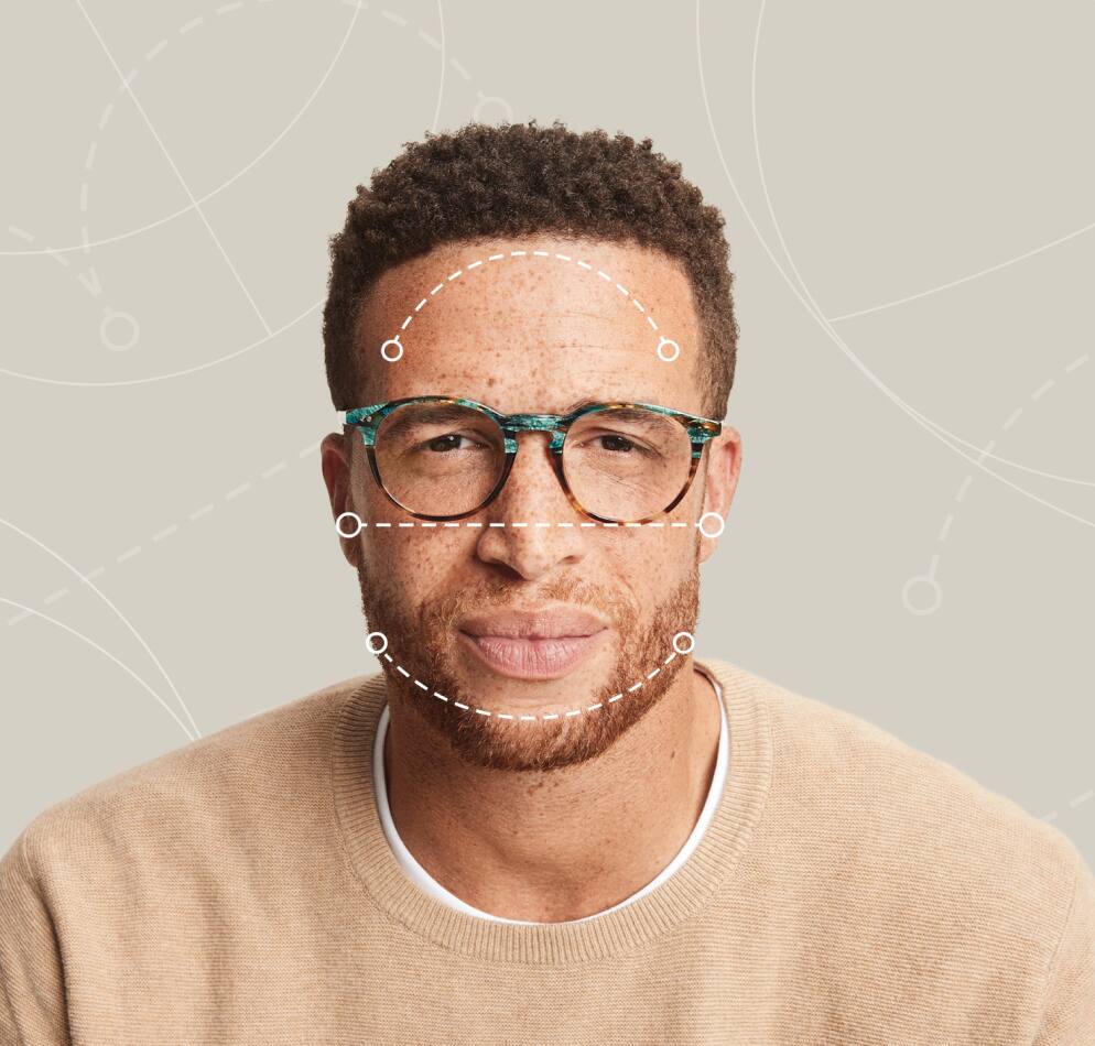 Image of a man wearing Zenni glasses, with dotted lines over his face showing the various dimensions of his face.
