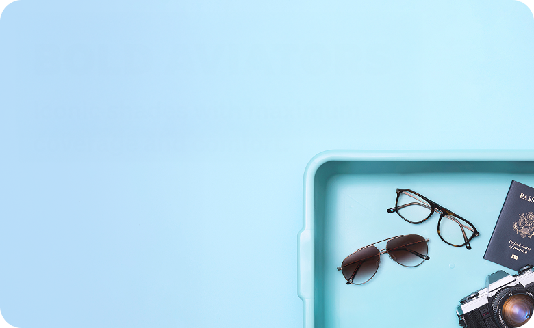A security screening tray containing a pair of metal aviator sunglasses and a pair of tortoiseshell eyeglasses, a passport, a Zenni glasses case, and a vintage film camera.